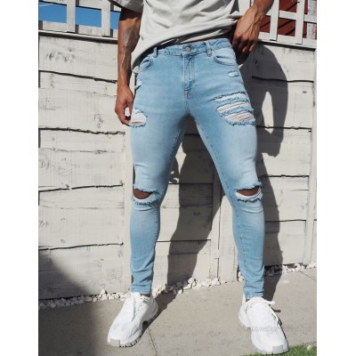  DESIGN spray on 'vintage look' jeans with power stretch in light wash blue with heavy rips  