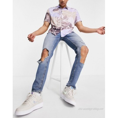  DESIGN skinny jeans in light wash blue with extreme rips  